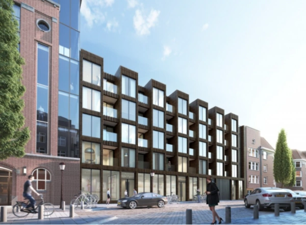 Modern appartementencomplex aan de Karel du Jardinstraat met glazen gevel en houten accenten.